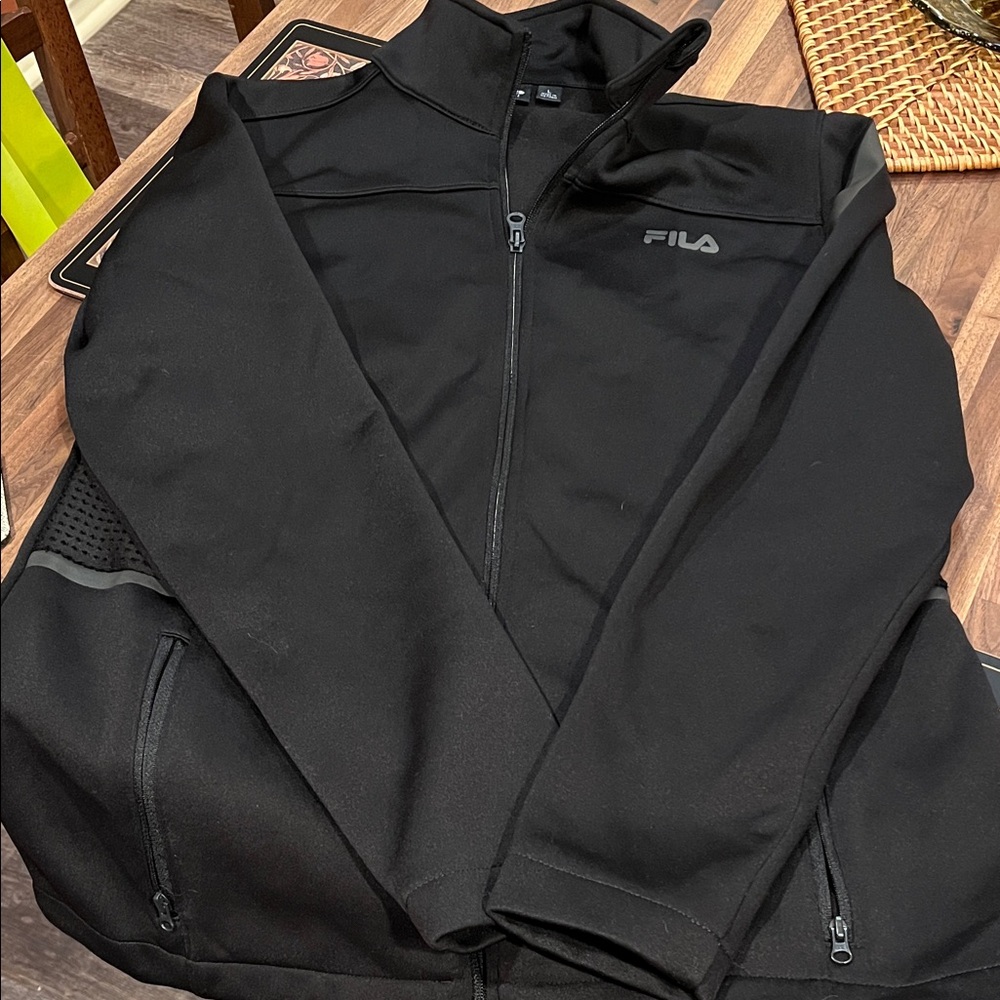 Fila Black women’s athletic performance jacket with mesh detail EUC